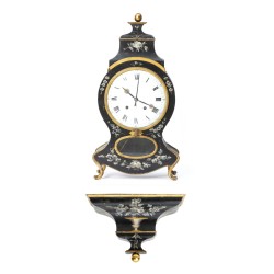 Neuchâtel-style clock in black and gold lacquered wood