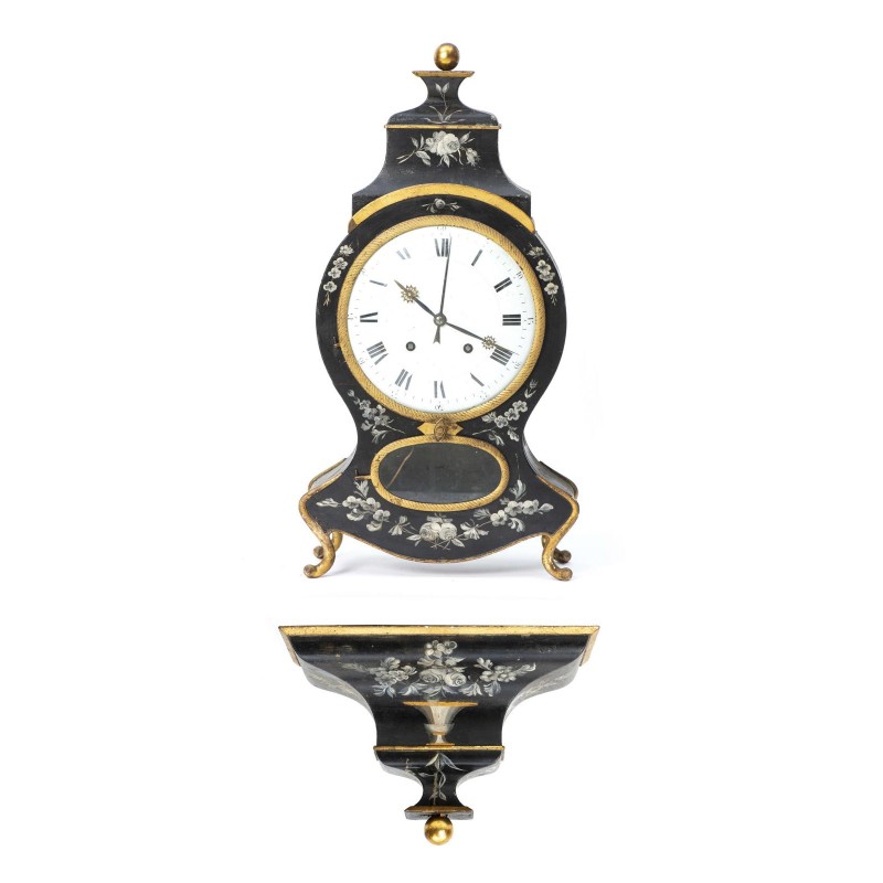 Neuchâtel-style clock in black and gold lacquered wood