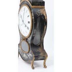 Neuchâtel-style clock in black and gold lacquered wood