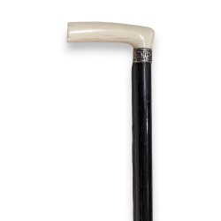 Walking stick with an ivory handle and a silver ring