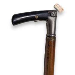Metal rifle stock with a wooden lining