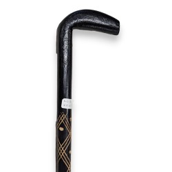 Monoxyl walking stick made of blackened wood