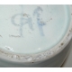 Pot with ginger, signed below.