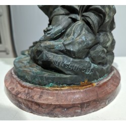 Bronze \"Femme tenant un iris\" signé S. KINSBURGER