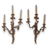 A pair of Louis XV wall sconces in gilded bronze
