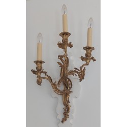 A pair of Louis XV wall sconces in gilded bronze