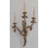 A pair of Louis XV wall sconces in gilded bronze